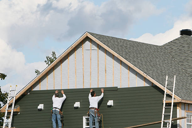 Professional Siding Contractor technician working in Dublin, OH